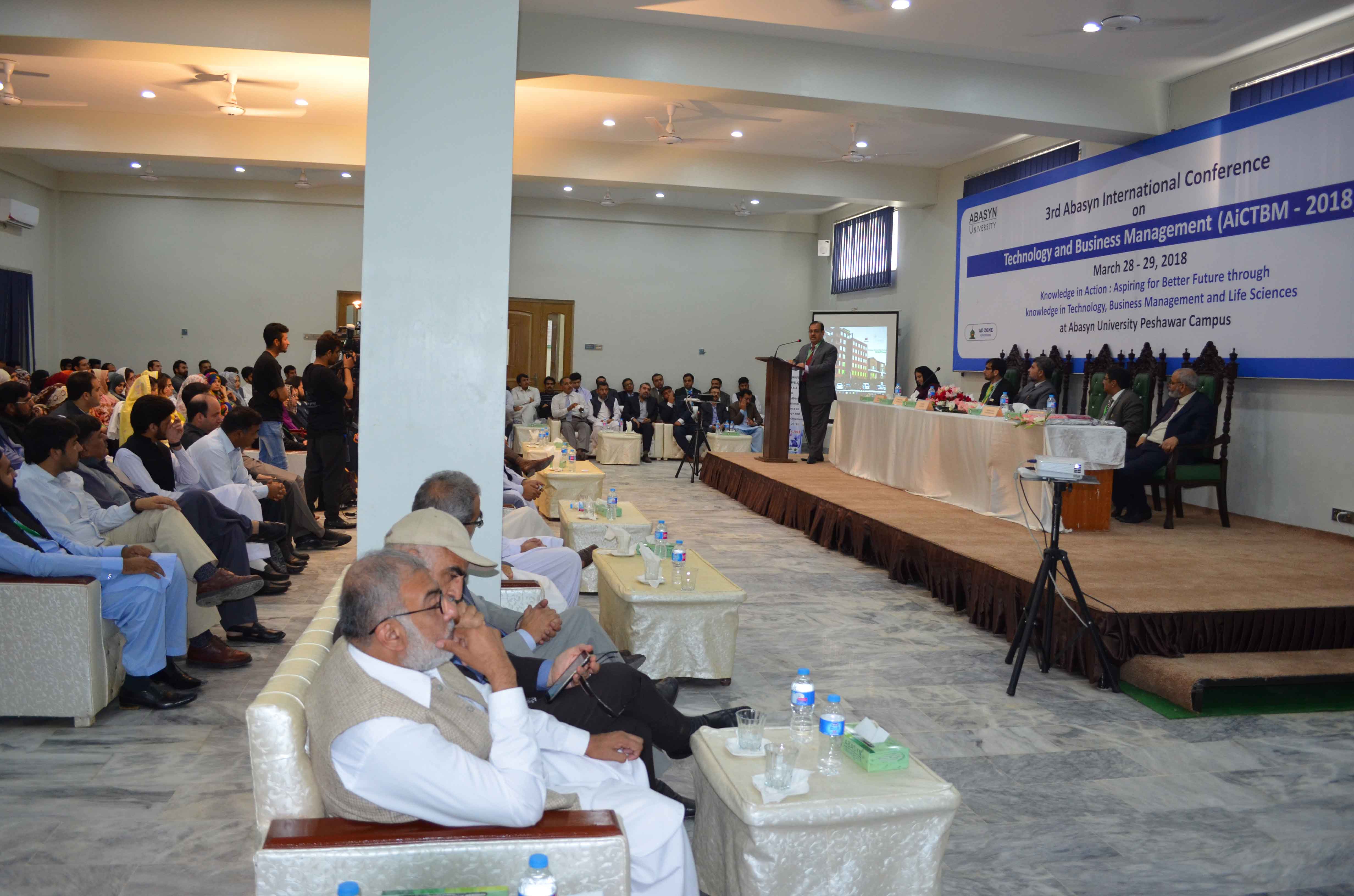 Honorable audience are listening the speech by different scholars at the conference