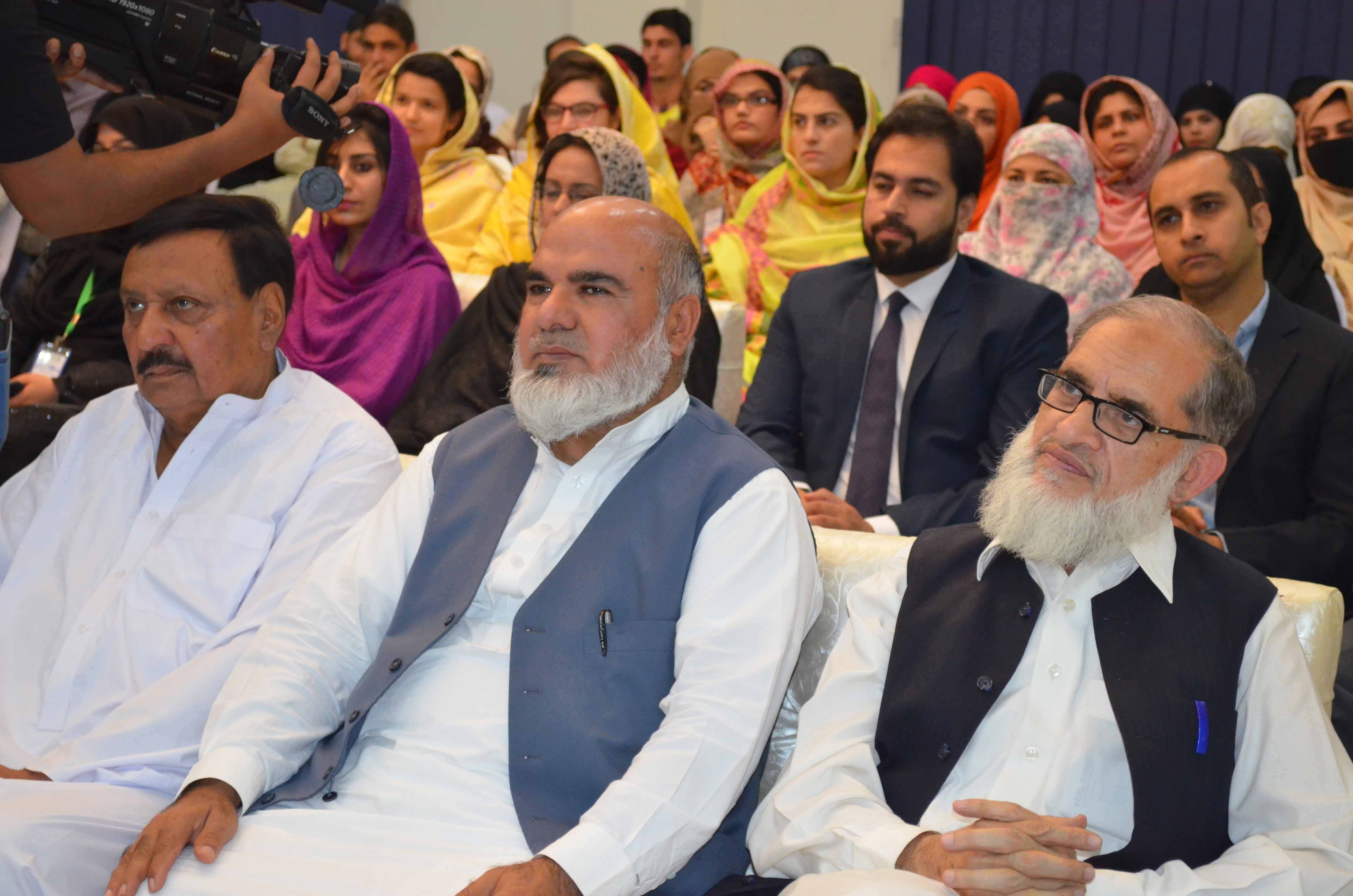 Honorable guests are listening the speech by different scholars at the conference